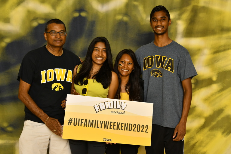 family members together at family weekend at iowa
